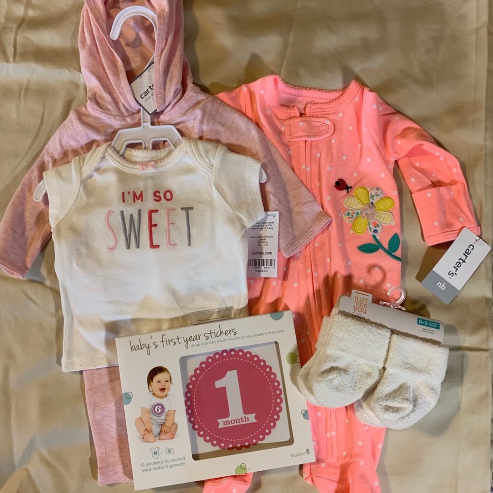 Bundle of Newborn Carters Clothes. New with tags!